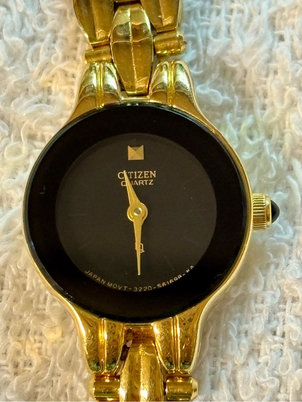 Citizen Gold Tone and Black Face Minimalist Bracelet Watch 6 inches in length.